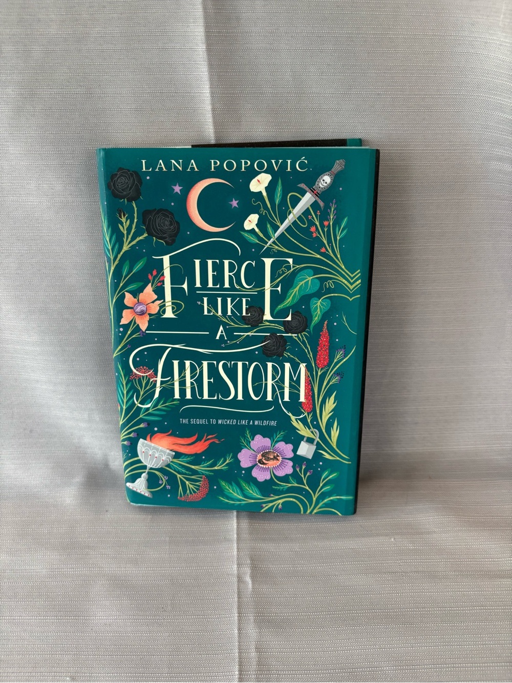 Fierce Like a Firestorm by Lana Popović - Teal Floral Hardcover